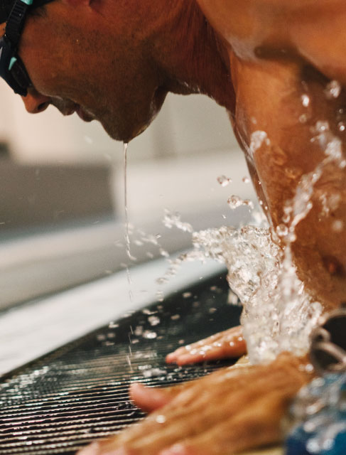 Holmes Place | man coming out of swimming pool