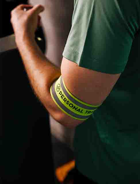 Holmes Place | man with personal training band on his arm